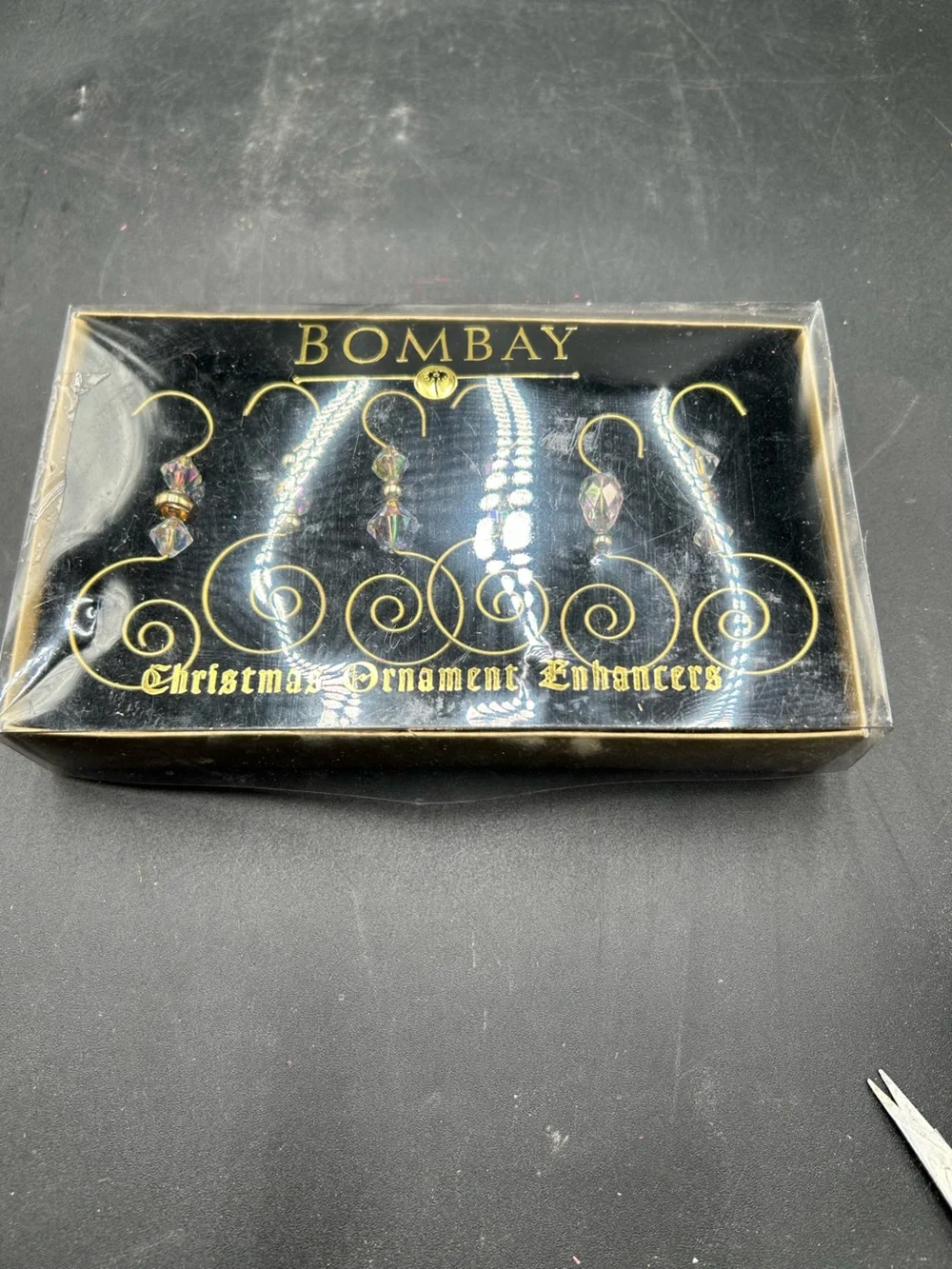 Vintage Bombay Christmas ornament enhancers, ornament holders hooks